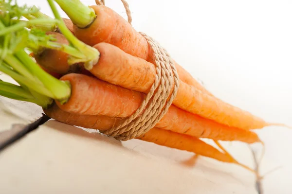 Baby carrots bunch tied with rope — Stock Photo, Image