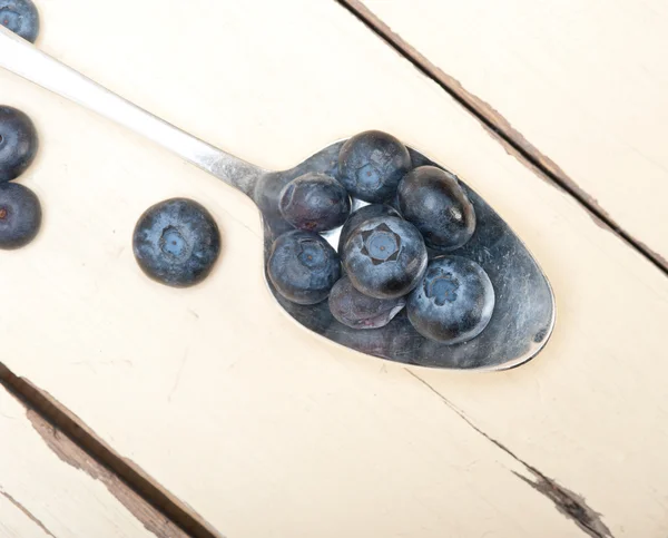 Fresh blueberry on silver spoon — Stock Photo, Image
