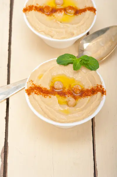 Hummus with mint on top — Stock Photo, Image