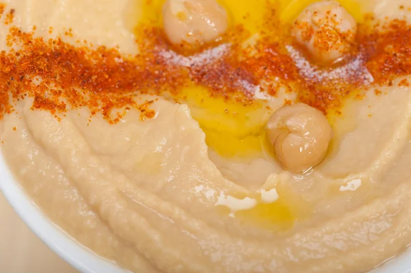 Hummus with mint on top — Stock Photo, Image