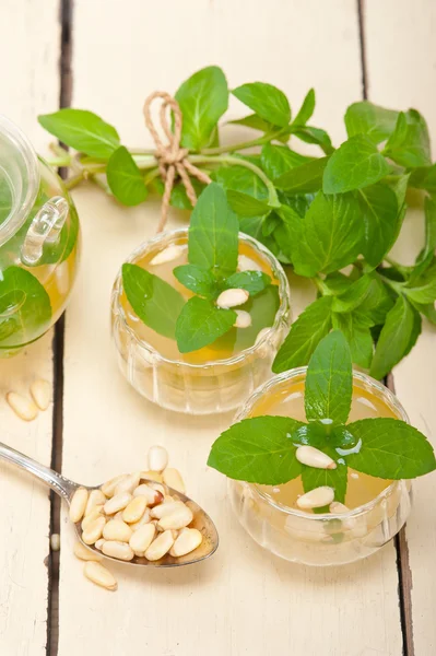 Arab traditional mint and pine nuts tea — Stock Photo, Image