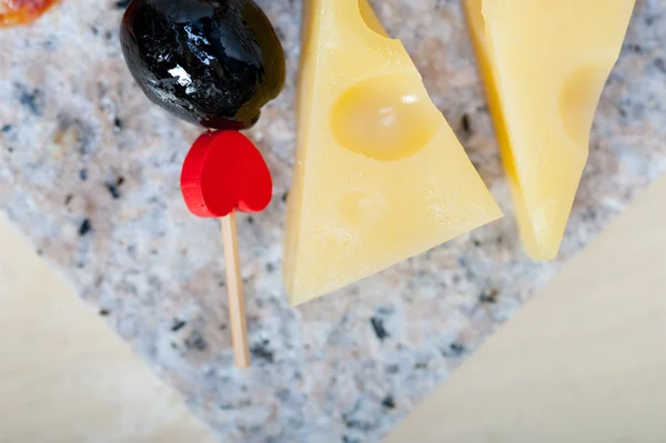 Mix cold cut on a stone with fresh pears — Stock Photo, Image