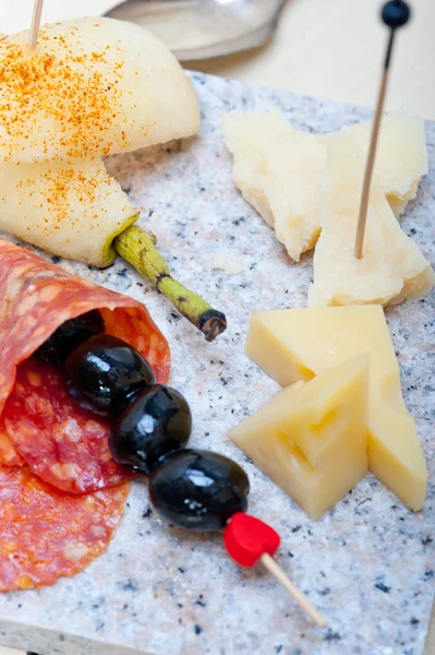 Mix cold cut on a stone with fresh pears — Stock Photo, Image