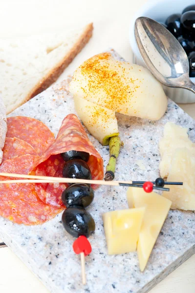 Mix cold cut on a stone with fresh pears — Stock Photo, Image