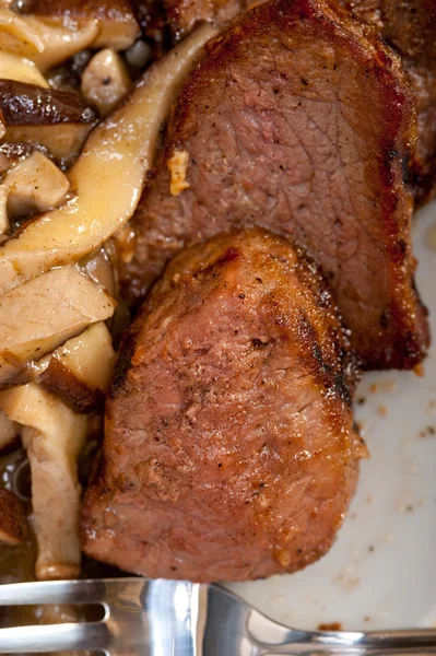 Venison deer game filet and wild mushrooms — Stock Photo, Image