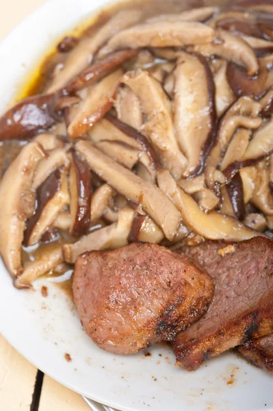 Venison deer game filet and wild mushrooms — Stock Photo, Image