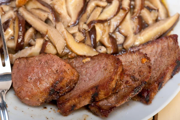 Venison deer game filet and wild mushrooms — Stock Photo, Image