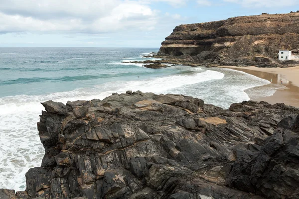 Puertito de los Molinos é uma pequena aldeia em Fuerteventura quase construído sobre o beac — Fotografia de Stock