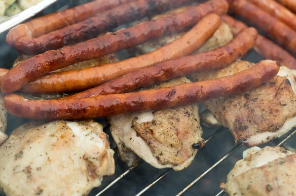 Barbecue with delicious grilled meat on grill — Stock Photo, Image