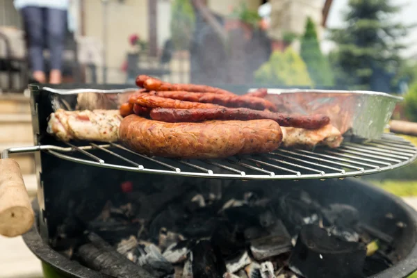 Barbecue with delicious grilled meat on grill — Stock Photo, Image