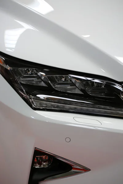 Lexus  front headlight displayed at 3rd edition of MOTO SHOW in Cracow Poland. Exhibitors present  most interesting aspects of the automotive industry — Stock Photo, Image