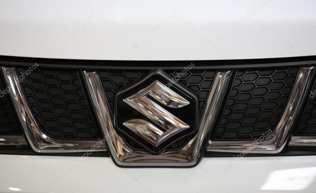 CRACOW, POLAND - MAY 21, 2016: Suzuki metallic logo closeup on Suzuki  car displayed at 3rd edition of MOTO SHOW in Cracow Poland. Exhibitors present  most interesting aspects of the automotive industry