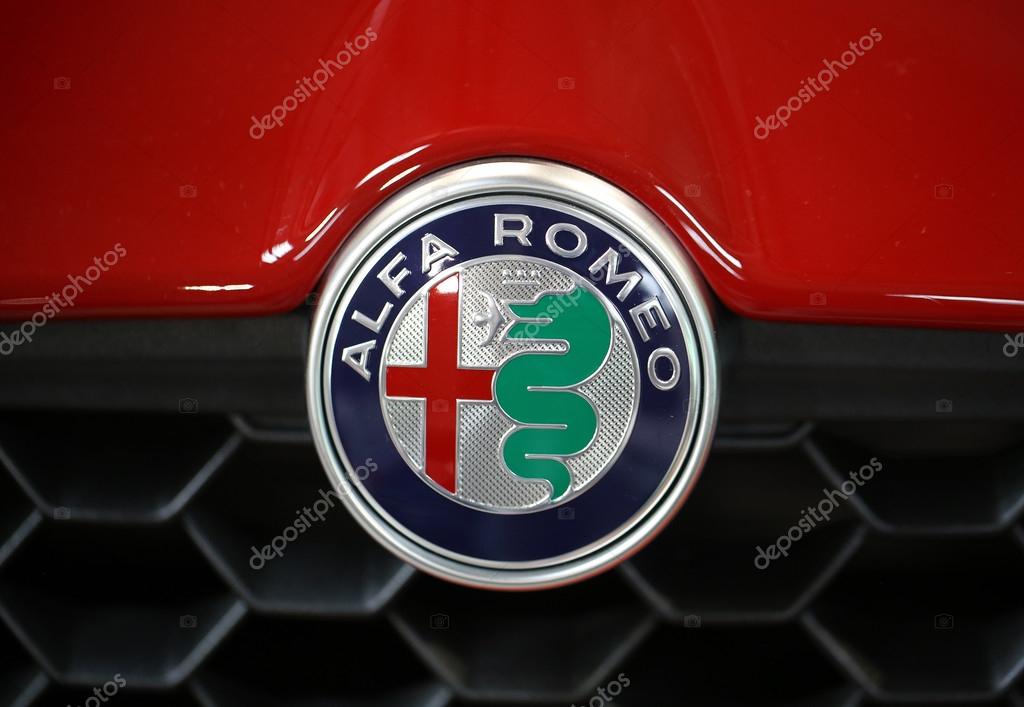 CRACOW, POLAND - MAY 21, 2016: Alfa Romeo metallic logo closeup on Alfa Romeo car displayed at 3rd edition of MOTO SHOW in Cracow Poland. Exhibitors present  most interesting aspects of the automotive industry