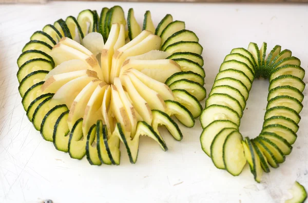 The decoration from the cheese and the courgette — Stock Photo, Image