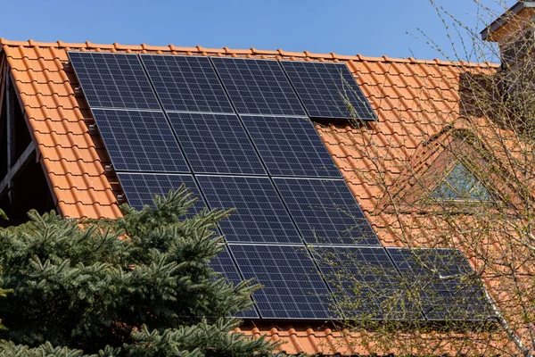 Solar electric panels on a house roof
