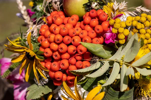 Traditional bouquet of flowers, herbs and fruits that are the symbol of summer