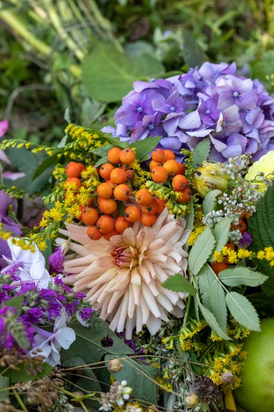 Traditional bouquet of flowers, herbs and fruits that are the symbol of summer