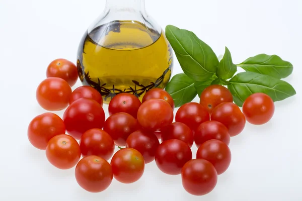 Basil, tomatoes and olive oil with the thyme — Stock Photo, Image