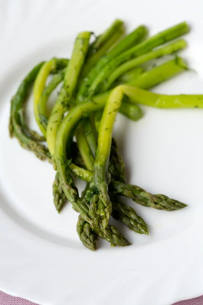 Green asparaguses with the fresh dill — Stock Photo, Image
