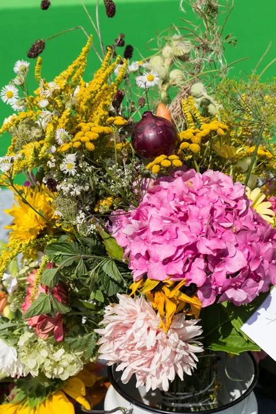 Beautiful bouquets of flowers and herbs — Stock Photo, Image