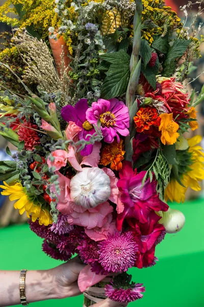 Beautiful bouquets of flowers and herbs — Stock Photo, Image