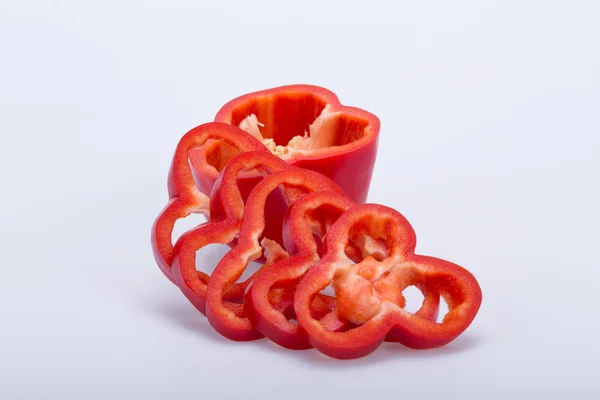 Sliced red pepper isolated on white background — Stock Photo, Image