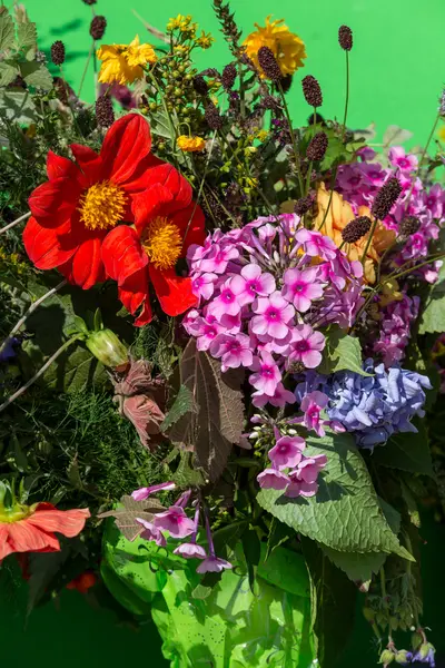 Beautiful bouquets of flowers and herbs — Stock Photo, Image