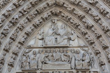 Paris - West facade of Notre Dame Cathedral. clipart
