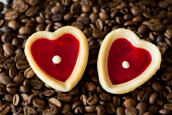 Two sweet hearts and coffe beans — Stock Photo, Image