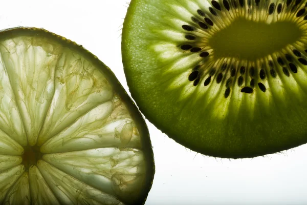 Lemon and kiwi fruit isolated on white background — Stock Photo, Image