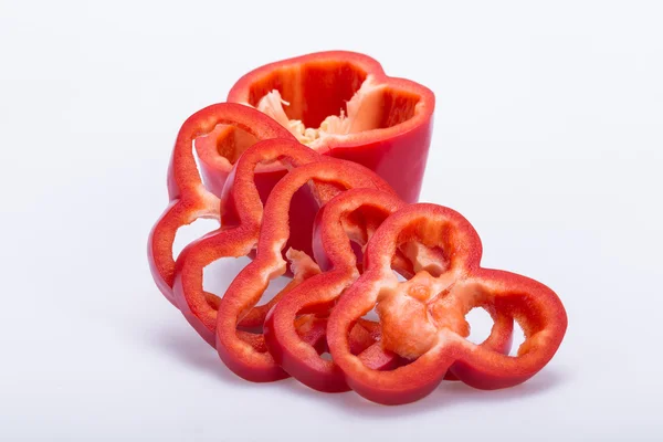 Sliced red pepper isolated on white background — Stock Photo, Image