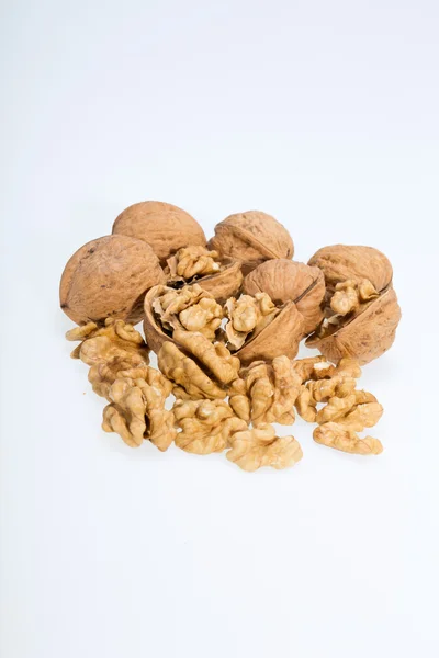 Walnut and a cracked walnut isolated on the white background — Stock Photo, Image