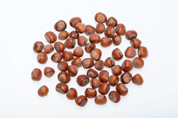 Pile of hazelnuts isolated on white background — Stock Photo, Image