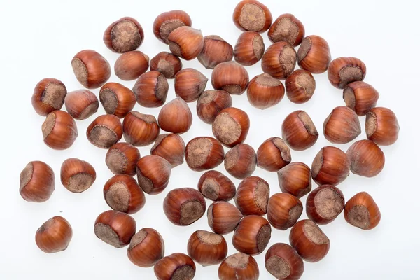Pile of hazelnuts isolated on white background — Stock Photo, Image