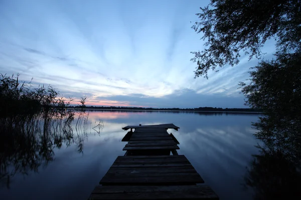 Old wooden pier at the lake — Stock Photo, Image