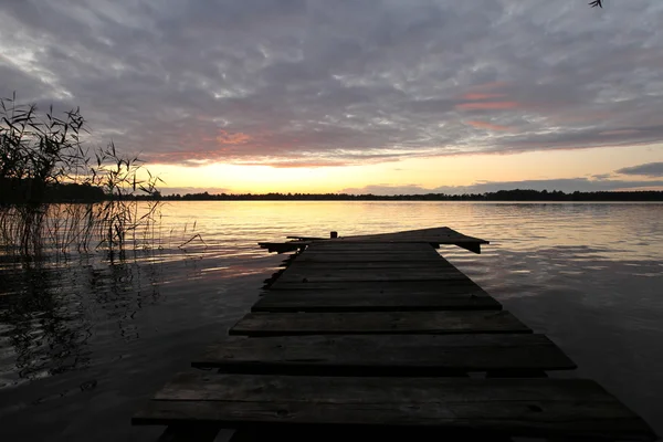 Old wooden pier at the lake — Stock Photo, Image