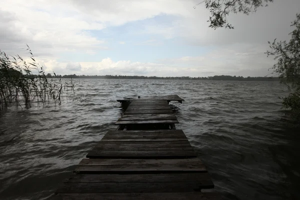 Old wooden pier at the lake — Stock Photo, Image