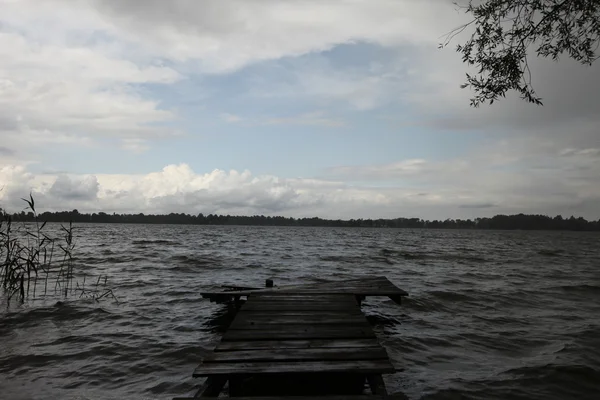 Old wooden pier at the lake — Stock Photo, Image