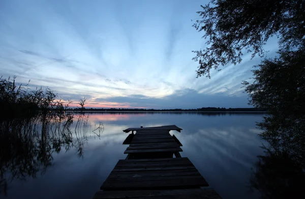 Old wooden pier at the lake — Stock Photo, Image