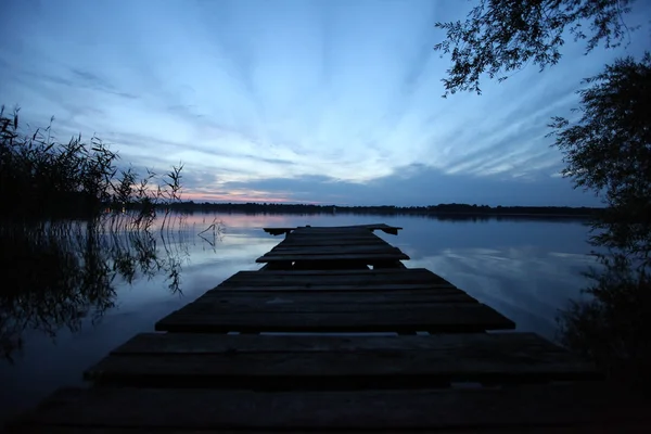 Old wooden pier at the lake — Stock Photo, Image