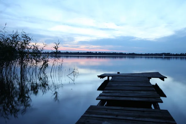 Old wooden pier at the lake — Stock Photo, Image