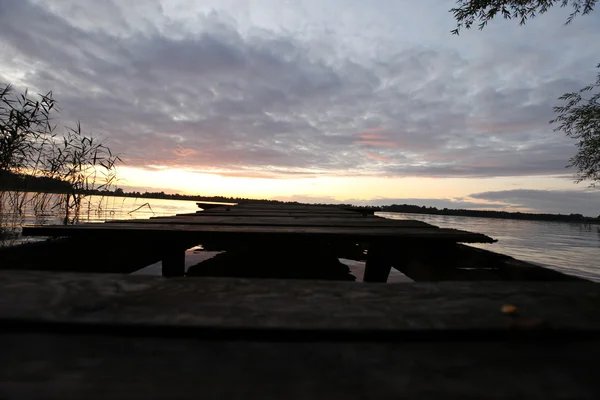 Old wooden pier at the lake — Stock Photo, Image