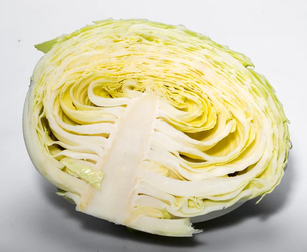 White  cabbage, texture of cut white  cabbage showing inside curly surface — Stock Photo, Image