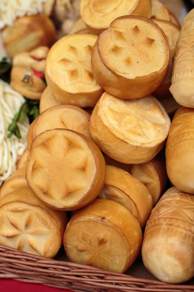 Polish traditional smoked cheese made of salted sheep milk called oscypek — Stock Photo, Image