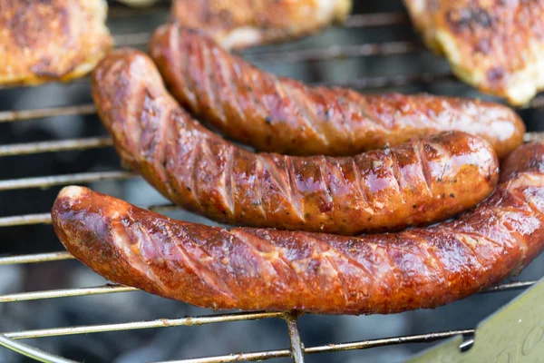 Barbecue with delicious grilled meat on grill — Stock Photo, Image