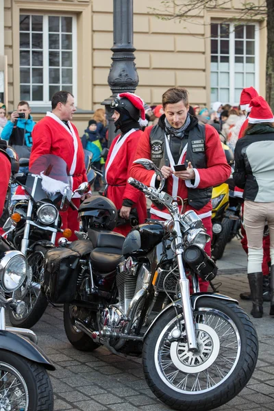 the parade of Santa Clauses on motorcycles around the Main Market Square in Cracow.