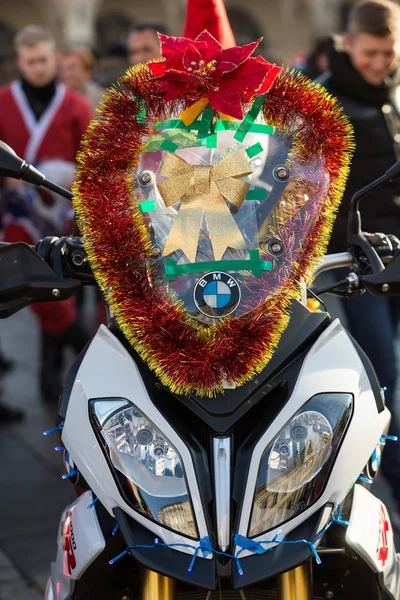 the parade of Santa Clauses on motorcycles around the Main Market Square in Cracow. Poland