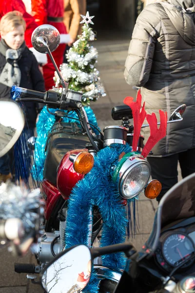 The parade of Santa Clauses on motorcycles around the Main Market Square in Cracow. Poland — Stock Photo, Image