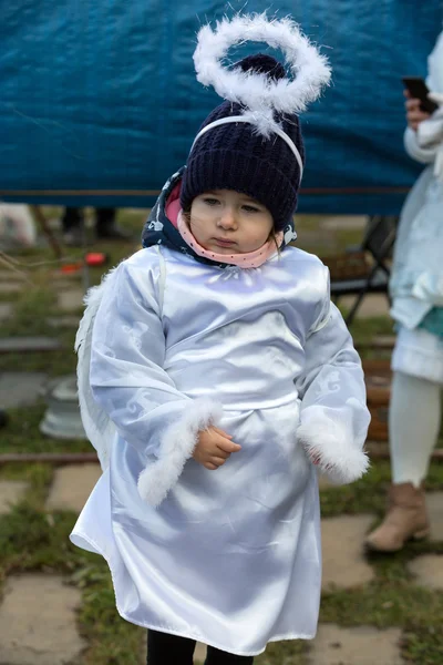 stock image the winter-festival Angel in the country town.