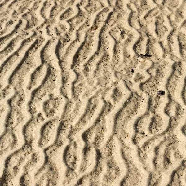 Closeup of sand pattern of a beach in the summer — Stock Photo, Image